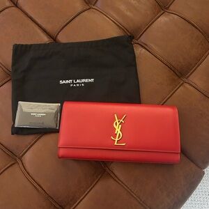 Saint Laurent Scarlet Clutch with Gold Logo